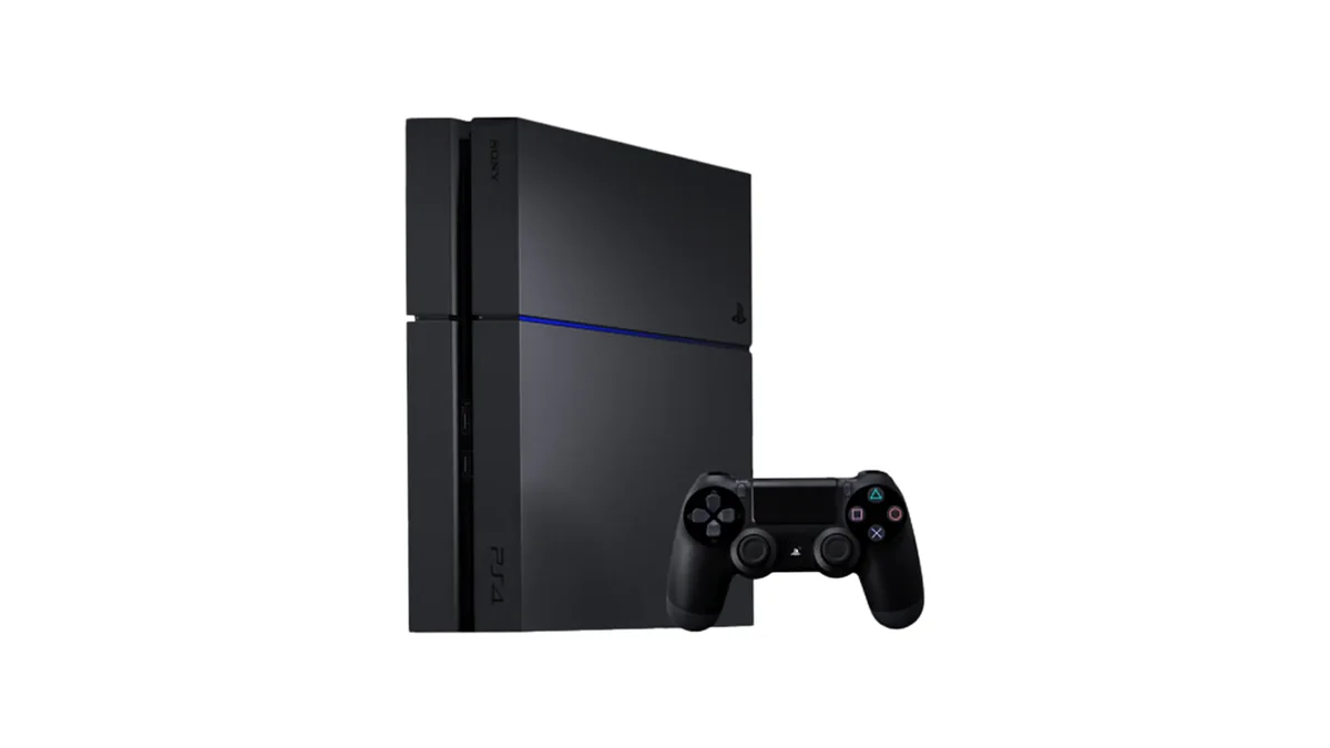 PlayStation 4 konzola sa DualShock kontrolerom na beloj podlozi