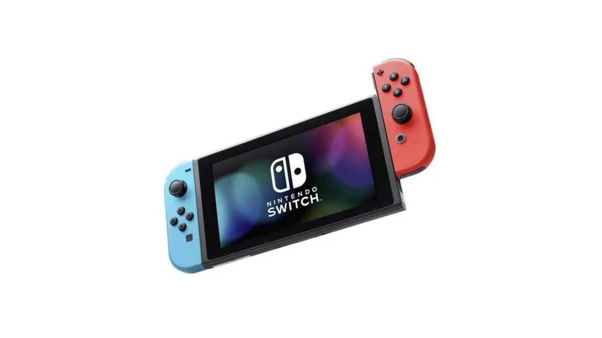 Nintendo Switch konzola sa Joy-Con kontrolerima na beloj podlozi